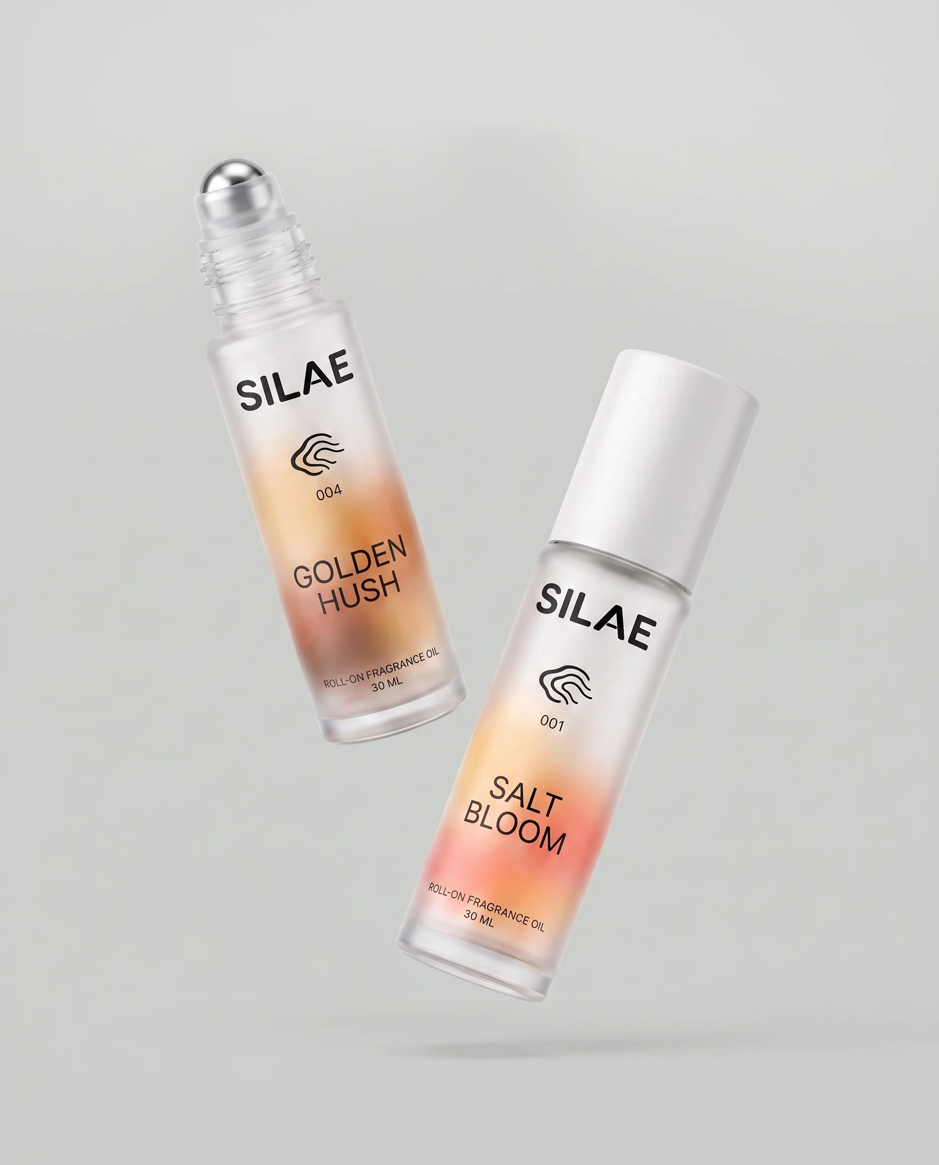 SILAE fragrance bottles floating in space