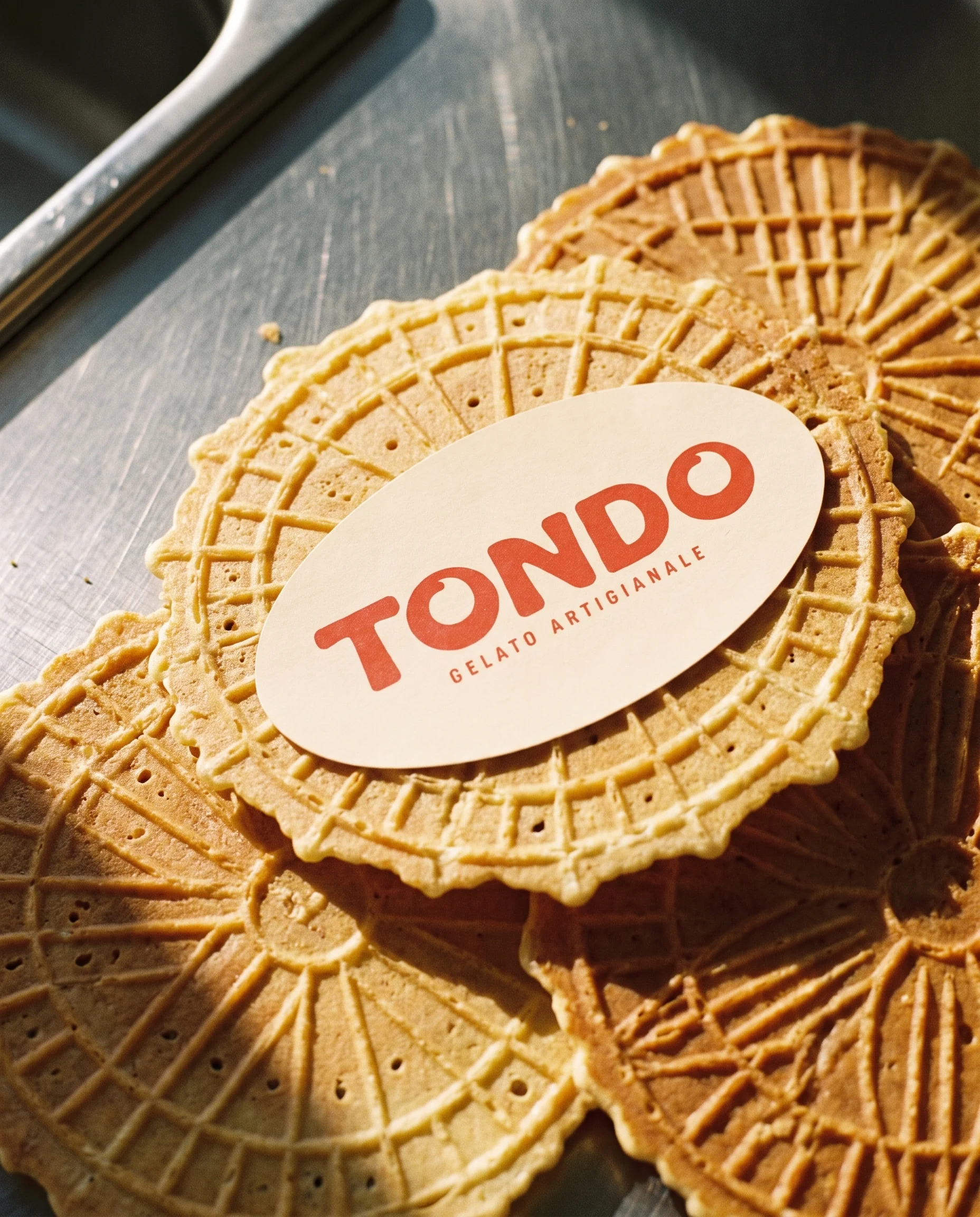 Golden TONDO pizzelle and branded sticker
